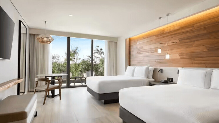 Swim-Up Tropical View Two Queen Beds Guestroom 